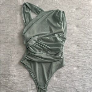 light blue mesh like bodysuit